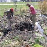 Tim and Jacob dig a garden bed