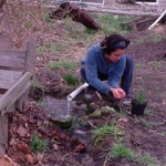 Kyra watering a plant